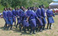 Schoolgirls dancing in rural Malawi